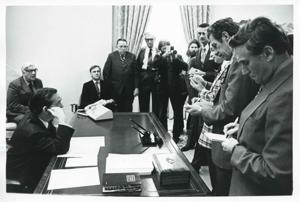 Carl Albert seated with Thomas P. O&#39;Neill and Fishbait Miller while reporters ask questions., 1974-10-09