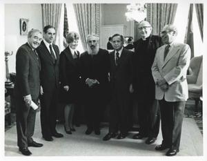 Carl Albert standing with an unidentified group in Albert&#39;s office., 1974-01-01 - 1974-12-31