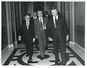 Members of Egyptian Parliament walking down a hall. May 1, 1975, 1975-05-01