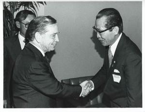 Carl Albert shaking hands with an unidentified Korean man during the Korean-U.S. Interparliamentary Conference. July 22-23, 1973, 1973-07-22