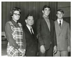 Carl Albert posing with three unidentified people, December 1967, 1967-12-01