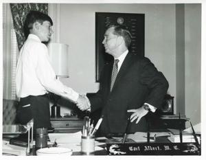 Carl Albert shaking hands with an unidentified man., 1950-01-01 - 1976-12-31