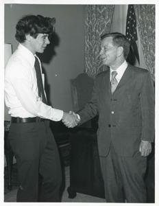 Carl Albert shaking hands with an unidentified man&#39;s hand., 1950-01-01 - 1976-12-31