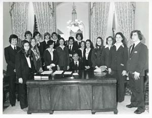 Carl Albert standing with the departing Pages (individual names on back of photo) on December 15, 1975, 1975-12-15