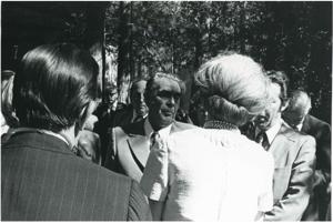 Millicent Fenwick, Edward Boland, and others seated at tables, during the House delegation trip. August 1975, 1975-08-04