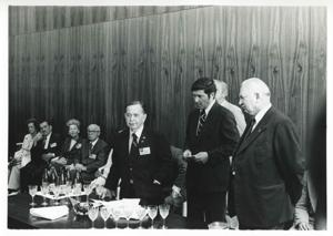 Carl Albert, Leonid Brezhnev, and other men walking outside in Yalta., 1975-08-04