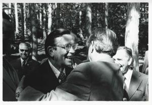 Carl Albert, Leonid Brezhnev, Phillip Burton, and others standing outside in Yalta. House delegation trip. August 1975, 1975-08-04