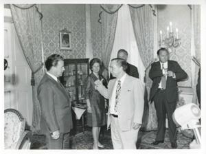 Carl Albert standing with several unidentified people., 1975-08-04