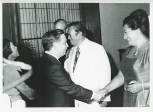 Carl Albert speaking with unidentified people., 1975-08-04