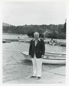 Cement Zablocki working at his desk., 1975-08-04