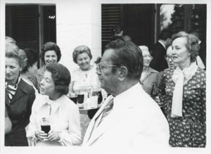Mary Albert seated on a couch with other women. House delegation trip. August 1975, 1975-08-04