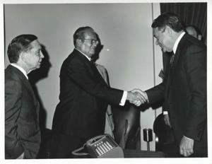 President Josip B. Tito of Yugoslavia shaking hands with Hale Boggs. Carl Albert is also shown., 1971-11-01