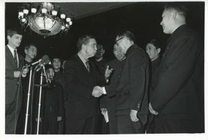 Carl Albert shaking hands with members of the Shenyang Acrobatic Troupe. January 13, 1973, 1973-01-13
