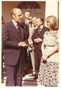 Gerald R. Ford speaking with an unidentified woman during the British Magna Carta Delegation at the White House. June 4, 1976, 1976-06-04