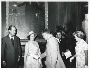 Queen Elizabeth and Prince Phillip shaking hands with others during a visit to the U.S., 1976-07-06