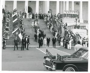Carl Albert, Queen Elizabeth, Nelson Rockefeller, Mike Mansfield, John Rhodes, Robert Byrd, and John Tower walking down the steps of the Capitol., 1976-07-06