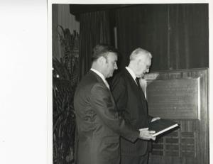 John W. McCormack standing with an unidentified man., 1950-01-01 - 1976-12-31
