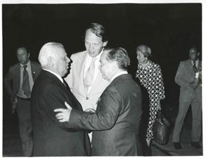 Carl Albert speaking to two men during the House delegation trip. August 1975, 1975-08-04 - 1975-08-29