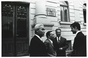 Carl Albert speaking with some men outside a building. House delegation trip. August 1975, 1975-08-04 - 1975-08-29