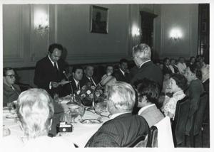 Carl Albert and Mary Albert seated at a dinner table with several others. House delegation trip. August 1975, 1975-08-04 - 1975-08-29