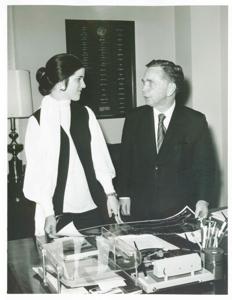 Carl Albert speaking to an unidentified woman., 1950-01-01 - 1976-12-31