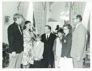 Carl Albert posing with an unidentified group of people., 1950-01-01 - 1976-12-31