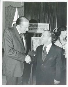 Carl Albert shaking hands with an unidentified man., 1950-01-01 - 1976-12-31