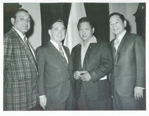 Carl Albert standing with three unidentified men., 1950-01-01 - 1976-12-31