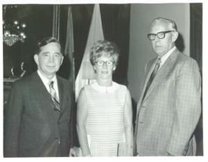 Carl Albert standing with Mr. and Mrs. H.E. Daniel during their visit to Washington, D.C. August 4, 1971, 1971-08-04