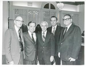 Carl Albert posing with E.T. Dunlap and three others and an unidentified man., 1950-01-01 - 1976-12-31