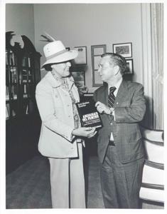 Carl Albert standing with Ruth Sheldon Knowles. May 23, 1975, 1975-05-23