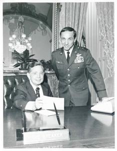 Carl Albert and Robinson Risner posing for a picture at Albert&#39;s desk. November 1974, 1974-11-01
