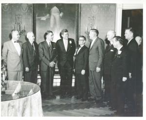 President John F. Kennedy standing with a large group of men, one of which is Carl Albert., 1950-01-01 - 1976-12-31