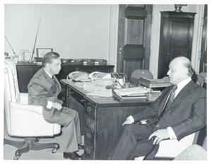 Carl Albert seated at his desk. Mayor Aliotas is seated next to him., 1950-01-01 - 1976-12-31