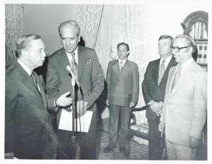 Carl Albert speaking into a microphone during the Bangladesh trip. July 1, 1976, 1976-07-01