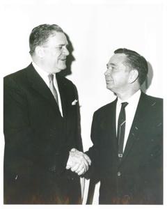 Carl Albert shaking hands with an unidentified man., 1950-01-01 - 1976-12-31