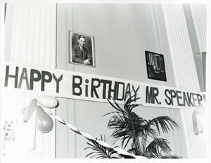 Banner reading, Happy Birthday Mr. Speaker. There are two photos above the banner of Mr. Albert., 1976-05-10