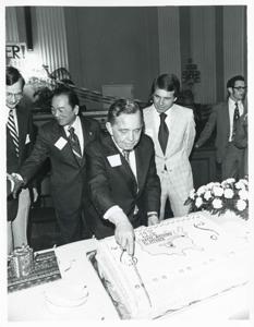 Carl Albert cutting his birthday cake, 1976-05-10