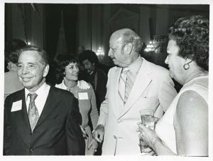 Carl Albert standing with Robert L.F. Sikes and others at his birthday party, 1976, 1976-05-10