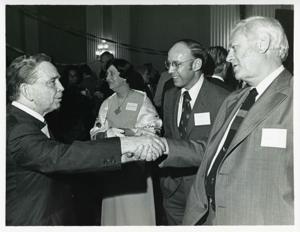 Carl Albert standing with James R. Jones and others at his birthday party, 1976, 1976-05-10