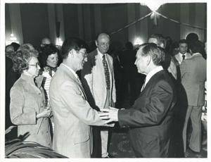 Carl Albert with unidentified people at his birthday party, 1976, 1976-05-10