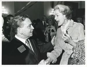 Carl Albert speaking with Millicent Fenwick at his birthday party, 1976, 1976-05-10
