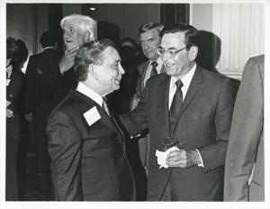 Carl Albert speaking with Edward Boland at his birthday party, 1976 Thomas P. O&#39;Neill is standing in the background, 1976, 1976-05-10