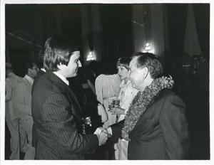 Carl Albert speaking with an unidentified man at his birthday party, 1976, 1976-05-10