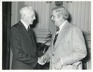 John W. McCormack shaking hands with Congressman Morgan Murphy at Carl Albert&#39;s birthday party, 1976, 1976-05-10