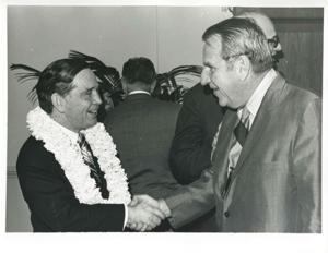 Carl Albert shaking hands with John N. Happy Camp at his birthday party. May 10, 1974, 1974-05-10