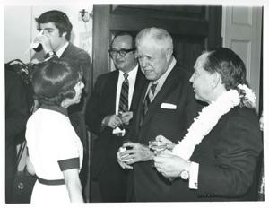 Mary Albert, W. R. Poage, Carl Albert, and others talking at Albert&#39;s birthday party. May 10, 1974, 1974-05-10