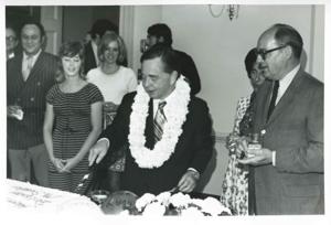 Carl Albert cutting the cake at his birthday party. May 10, 1974, 1974-05-10