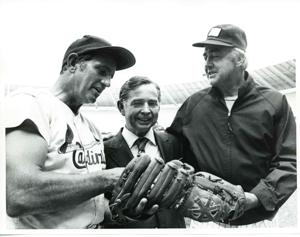 Carl Albert standing between two unidentified baseball players. June 21, 1976, 1976-06-21