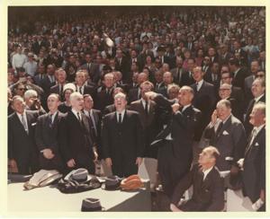 Mike Mansfield, John W. McCormack, Carl Albert, Hubert Humphrey, Lyndon B. Johnson, Lawrence F. O&#39;Brien, Leslie Arends, Gerald R. Ford, Russell Long, Everett Dirksen, and others. Johnson is throwing in the baseball. 1965, 1965-01-01 - 1965-12-31